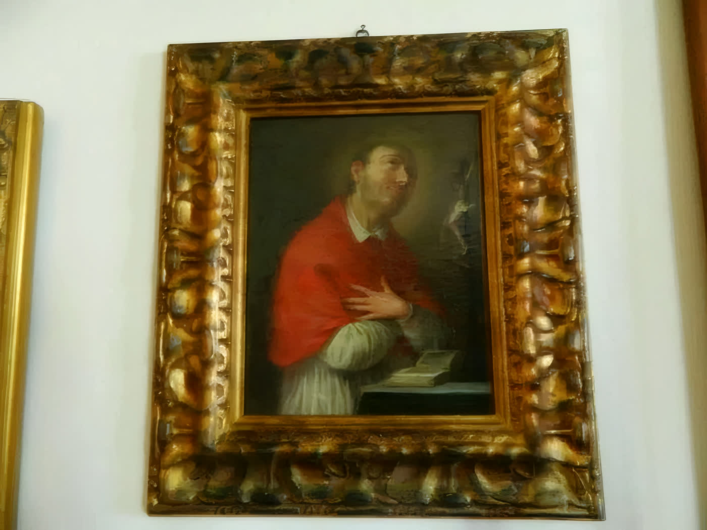 Dipinto antico con cornice dorata intagliata